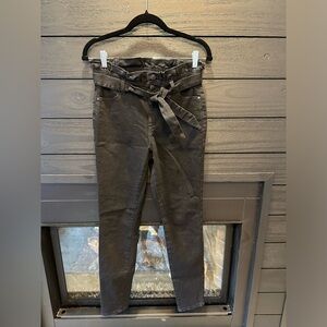 Solid black paper-bag jeans. Love these, hard to let them go!